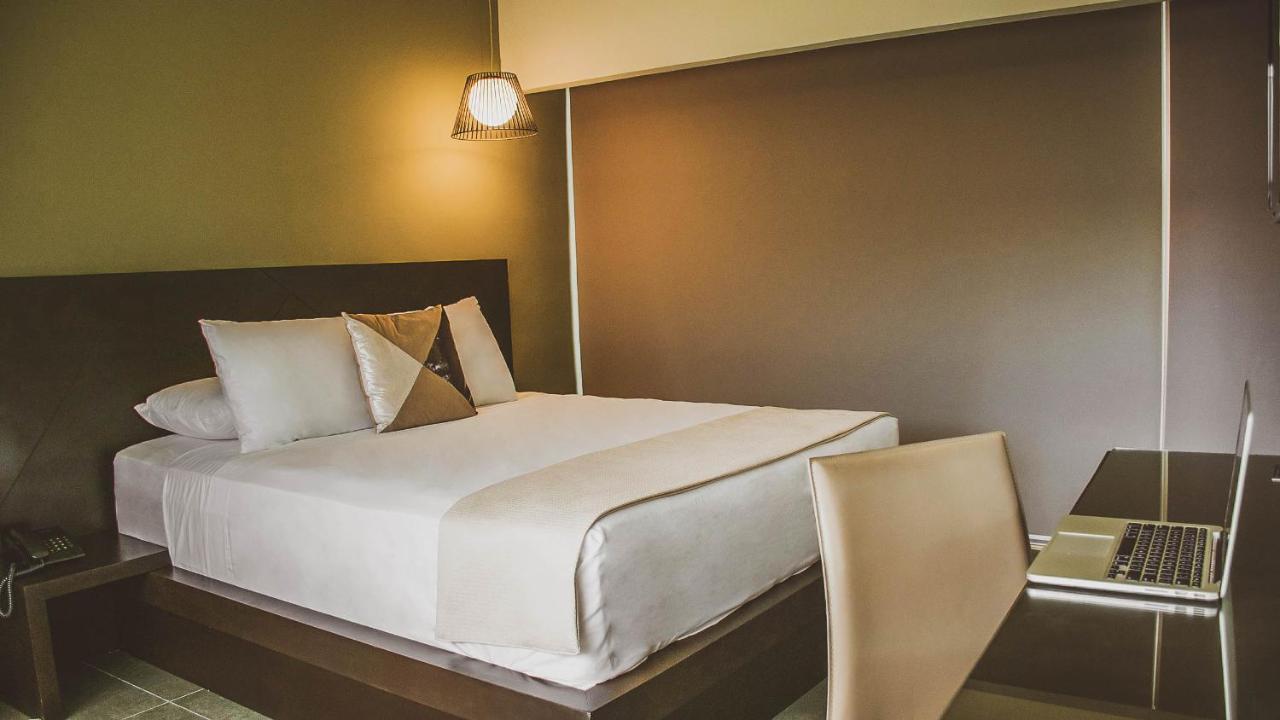 Remfort Hotel Santa Ana Buitenkant foto