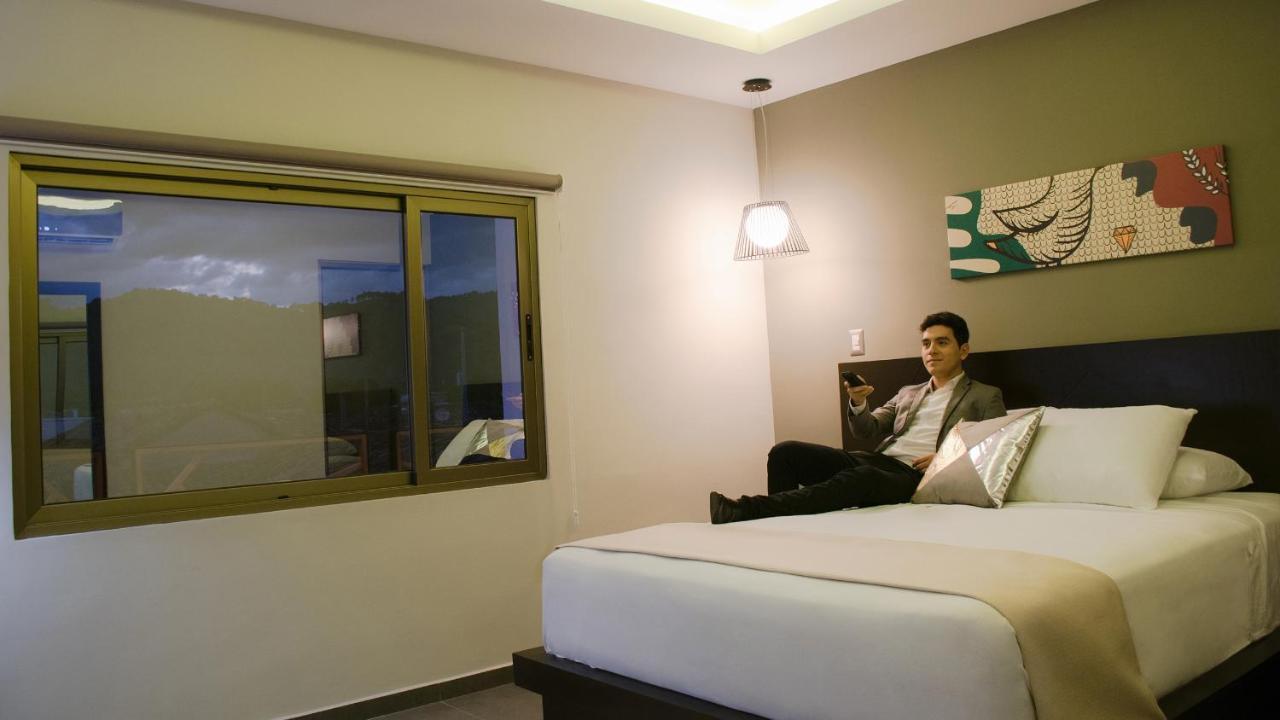 Remfort Hotel Santa Ana Buitenkant foto