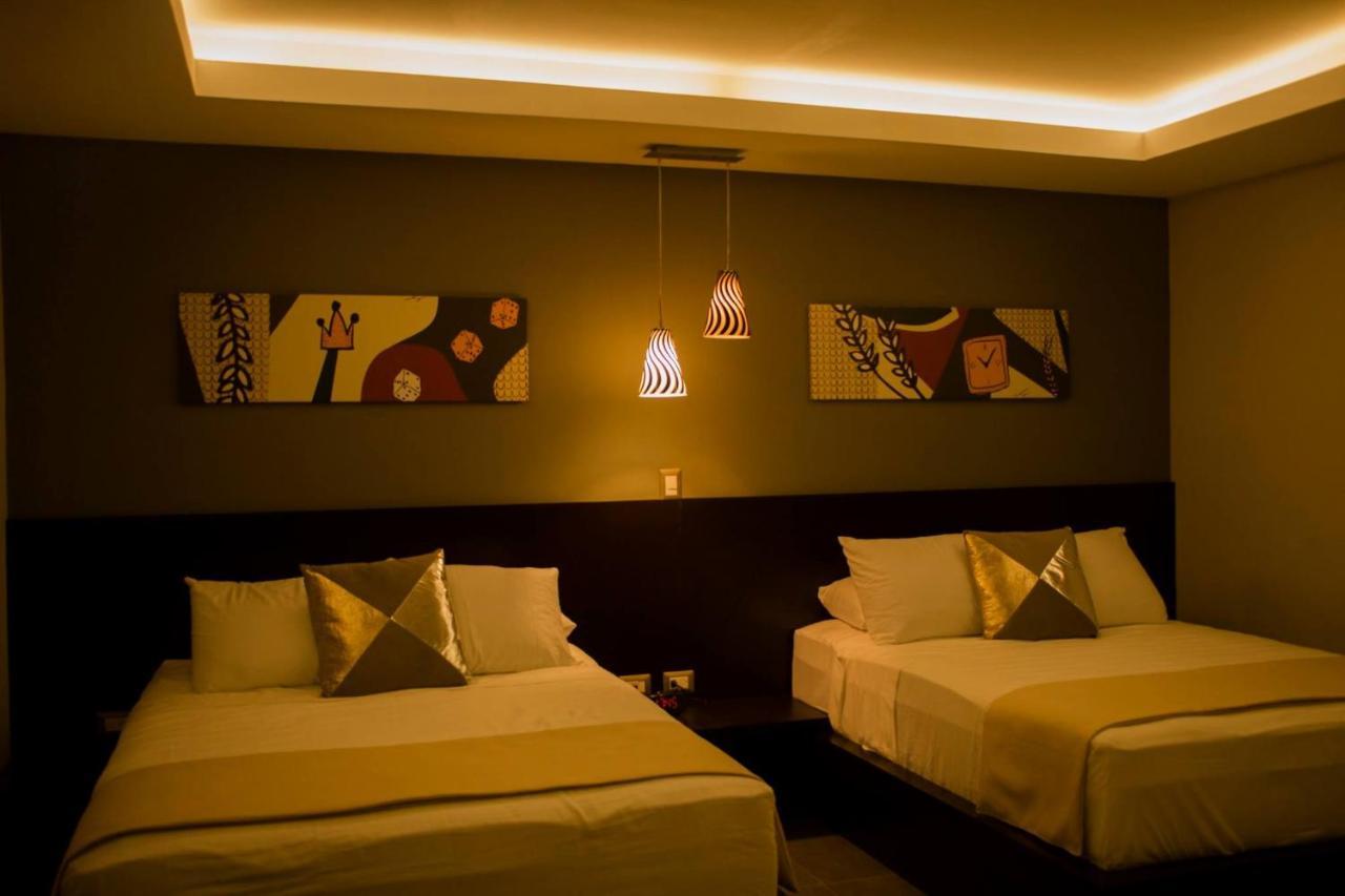 Remfort Hotel Santa Ana Buitenkant foto